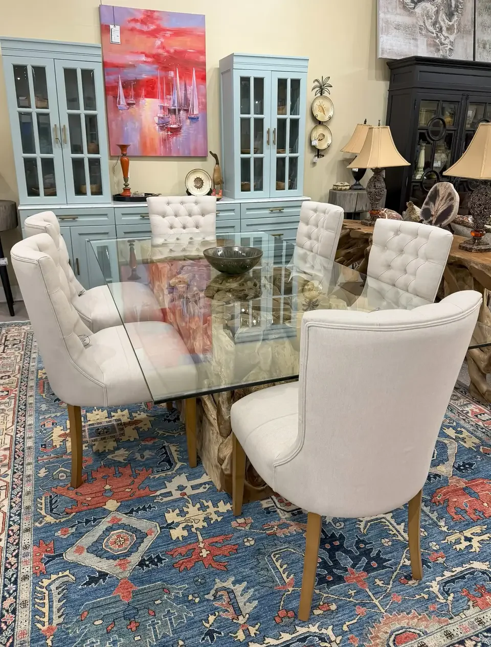 A tufted chair on the showroom floor at Capa Home